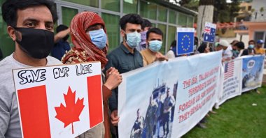 Afghan former interpreters for the U.S. and NATO forces gather during a demonstration in downtown Kabul, on the eve of the beginning of Washington's formal troop withdrawal – although forces have been drawn down for months, Kabul, Afghanistan, April 30, 2021. (AFP Photo)