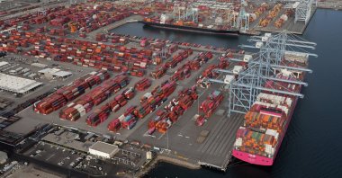 Shipping containers are unloaded from ships at a container terminal at the Port of Long Beach-Port of Los Angeles complex, in Los Angeles, California, U.S., April 7, 2021. (Reuters Photo)