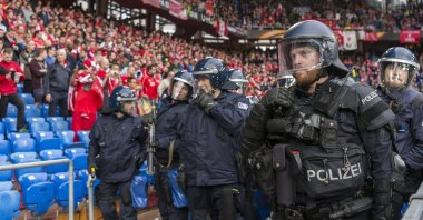 Riot police move into position ahead of the Europa League final between England's Liverpool FC and Spain's Sevilla Futbol Club at the St. Jakob-Park stadium in Basel, Switzerland, May 18, 2016. (AP Photo)