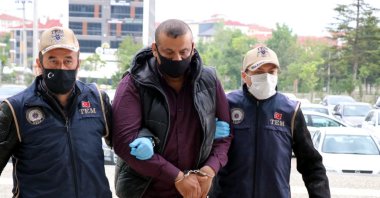 Police escort captured Daesh suspect Arkan Taha Ahmad (C), in Bolu, northern Turkey, June 4, 2021. (DHA Photo)