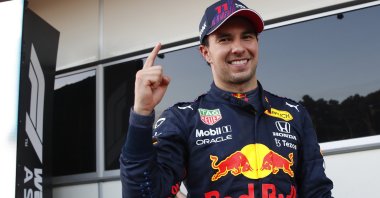 Red Bull driver Sergio Perez of Mexico celebrates after winning the Formula 1 Azerbaijan Grand Prix at the Baku City Circuit, Baku, Azerbaijan, June 6, 2021. (AP Photo)