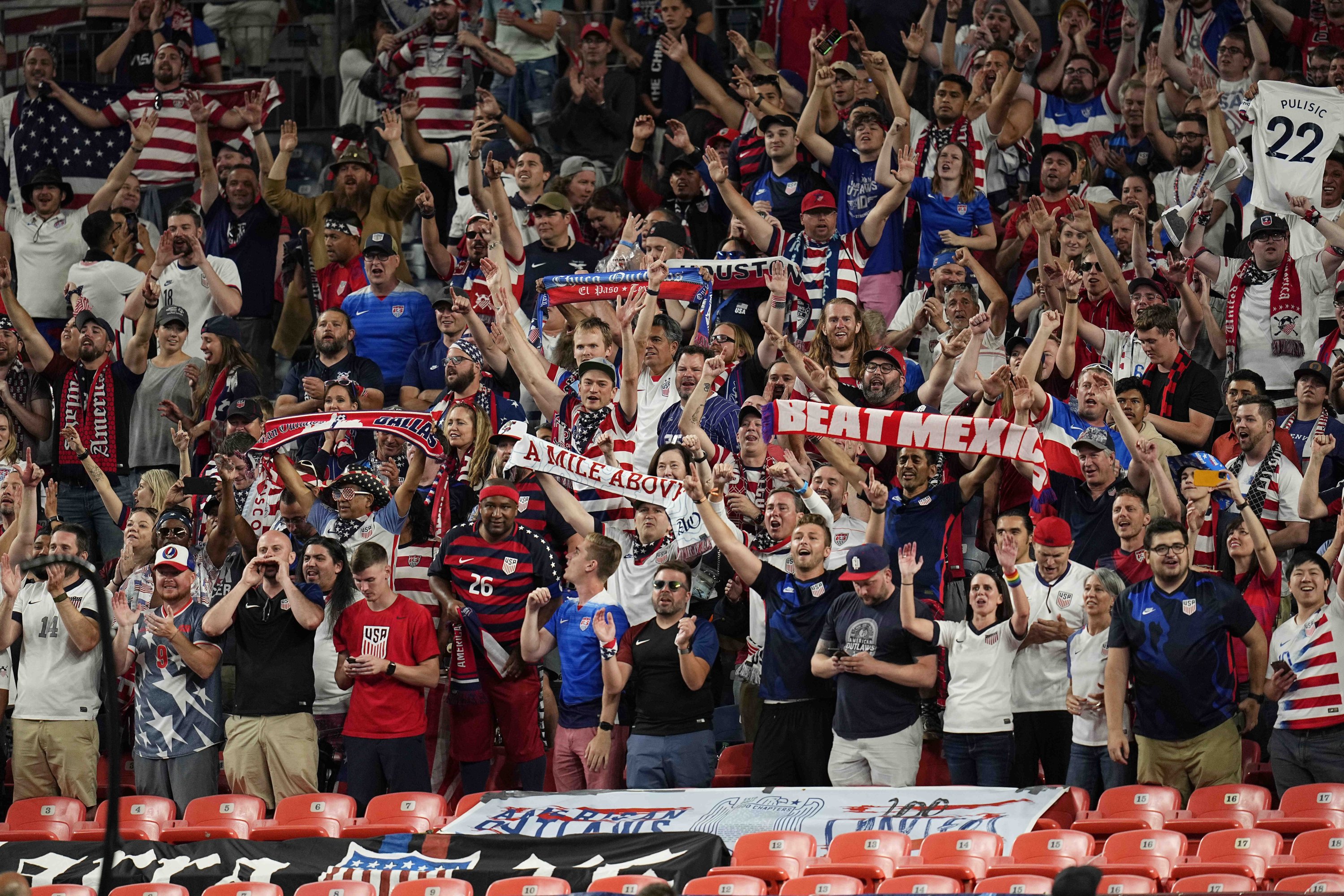 United States soccer fans cheer following the team's championship win against Mexico in extra time in the CONCACAF Nations League championship soccer match, Denver, Colorada, U.S., Sunday, June 6, 2021. (AP Photo)