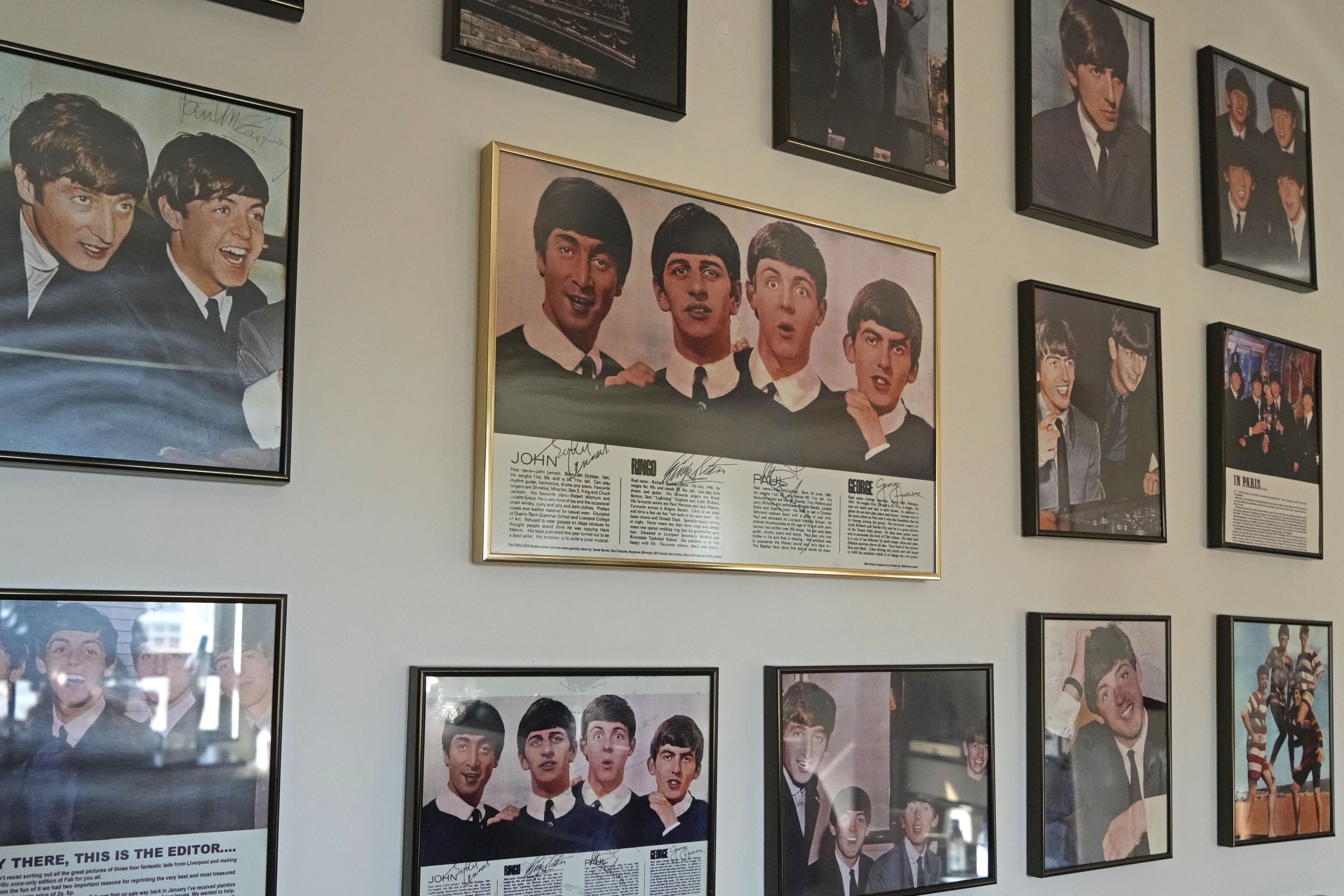 The copies of his Beatles' autographs are framed and displayed as the originals are kept with the lawyer, at Ray Cordeiro's home in Hong Kong, May 27, 2021. (AP Photo)
