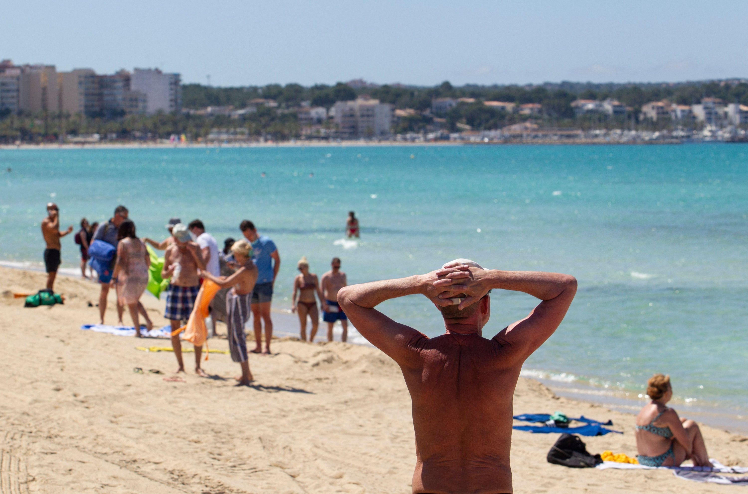 Tourists hang out at Palma Beach in Palma de Mallorca, Spain, June 7, 2021. (AFP Photo)