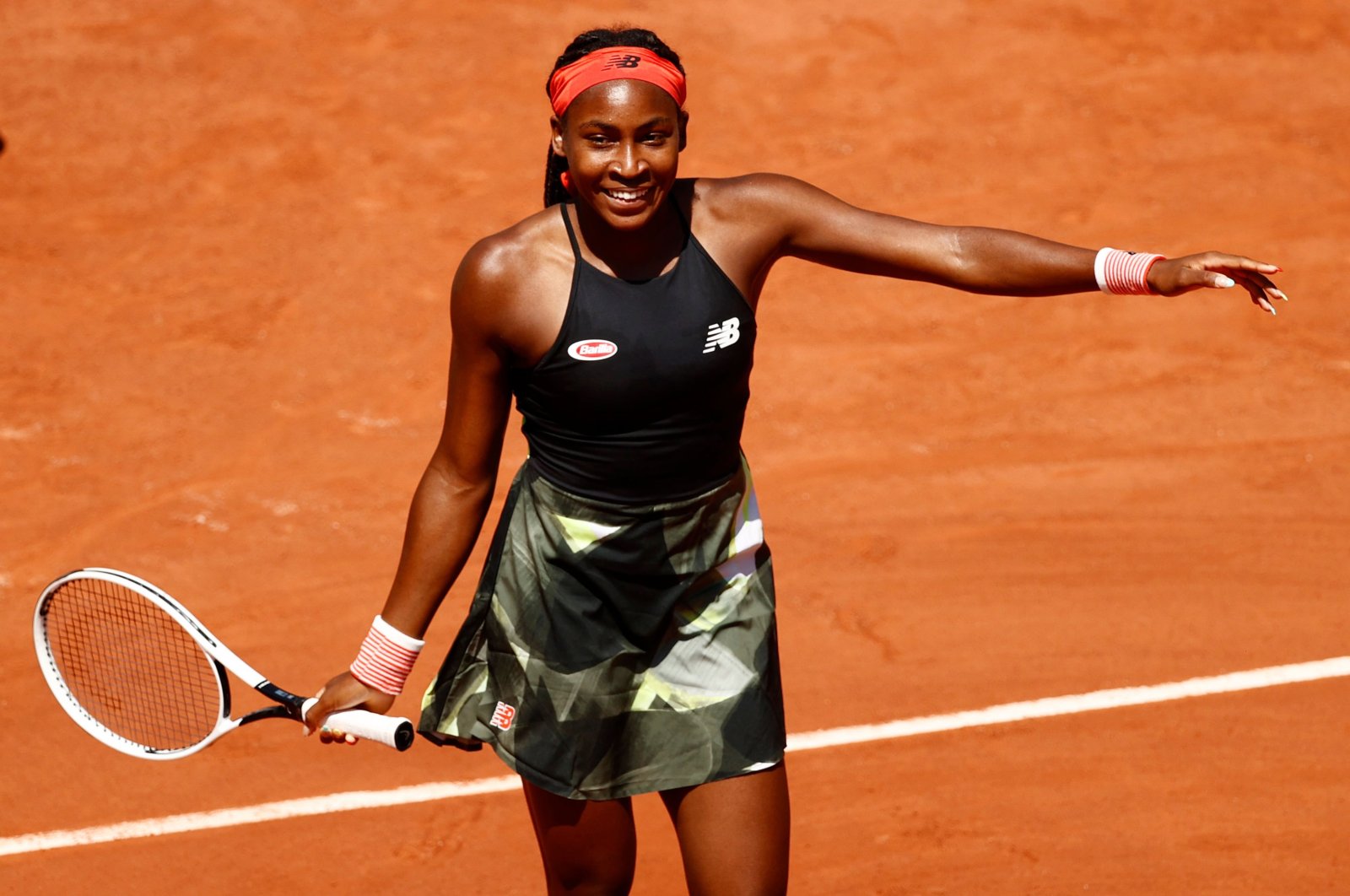 U.S. teenage tennis sensation Coco Gauff celebrates after winning her French Open fourth-round match against Tunisia's Ons Jabeur, at the Roland Garros, Paris, France, June 7, 2021. (Reuters Photo)