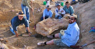 Researchers are seen digging for dinosaur fossils in Cooper Creek, near the town of Eromanga, Queensland, Australia, May 23, 2015. (The Eromanga Natural History Museum via AFP)