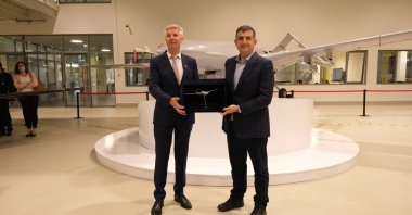 Latvian Deputy Prime Minister and Defense Minister Artis Pabriks (L) and Baykar Makina's General Manager Haluk Bayraktar at Baykar Makina's R&D and production facilities, Ankara, Turkey, June 7, 2021. (Baykar via AA)