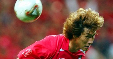 South Korea's Yoo Sang-chul jumps for a header, during the 2002 World Cup semifinal against Germany, at the Seoul World Cup stadium, Seoul, South Korea, June 25, 2002. (AP photo)