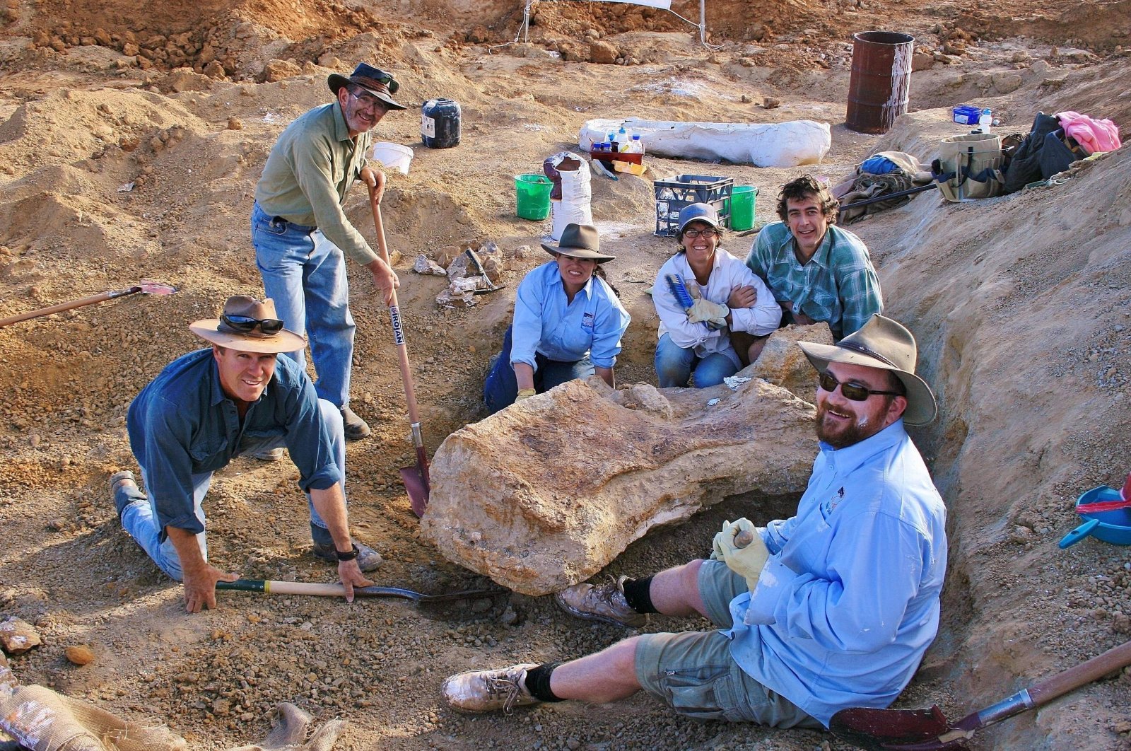 Researchers are seen digging for dinosaur fossils in Cooper Creek, near the town of Eromanga, Queensland, Australia, May 23, 2015. (The Eromanga Natural History Museum via AFP)