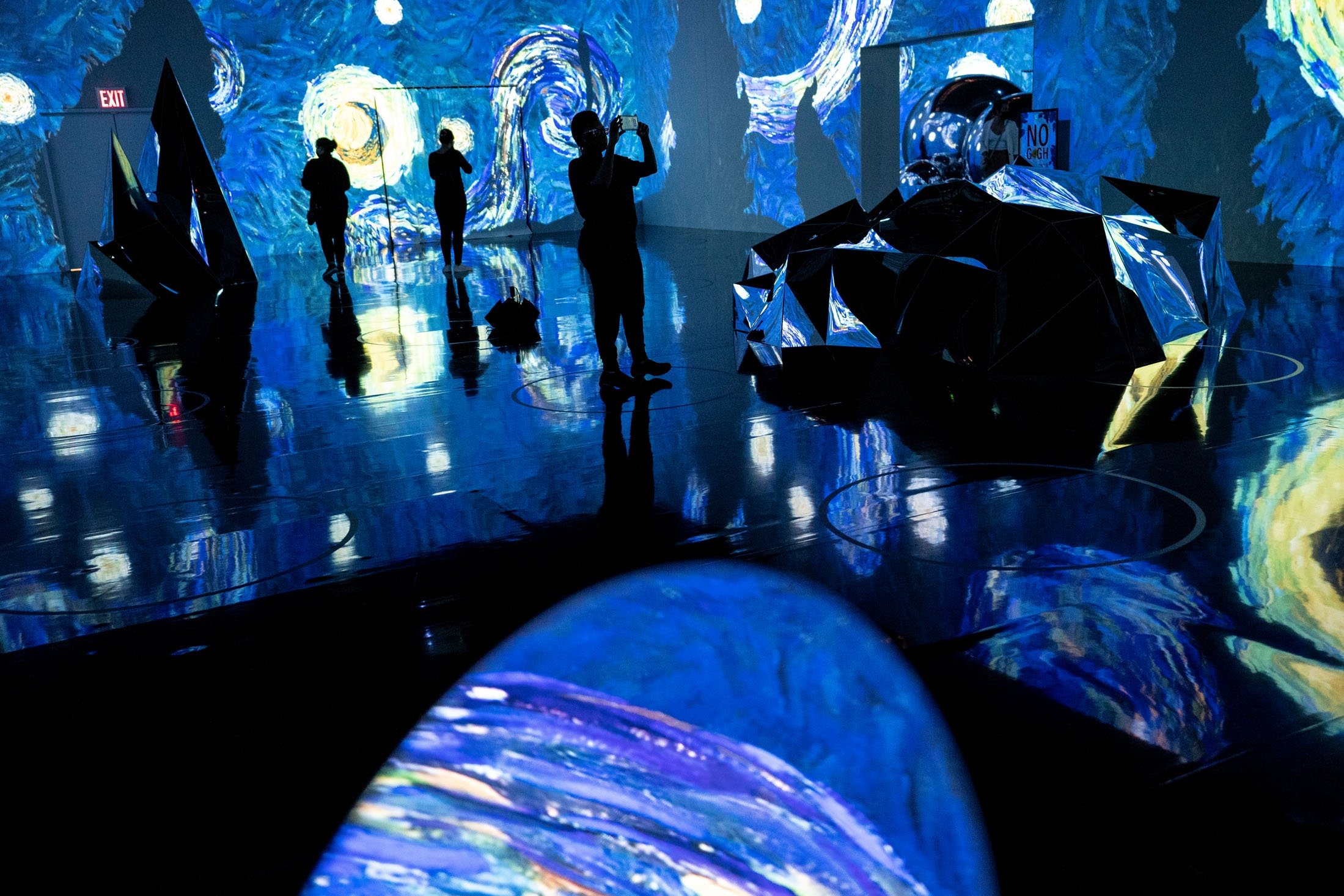 Projections of selected works of celebrated painter Vincent Van Gogh are displayed at a preview of the 'Immersive Van Gogh' exhibit at Pier 36 in New York, U.S., June 4, 2021. (AP Photo)