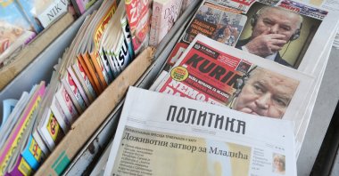 Balkan newspapers display a cover with Ratco Mladic, also known as the "Butcher of Bosnia," after the U.N. court's upholding of a life sentence, location unknown, June 9, 2021. (AA Photo)