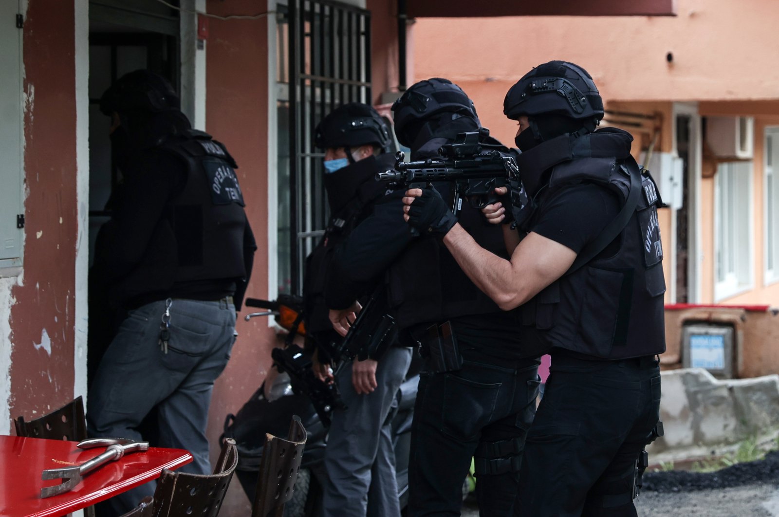 Police enter a home to carry out a raid against PKK terrorist suspects in Istanbul, Wednesday, June 9, 2021. (AA Photo)