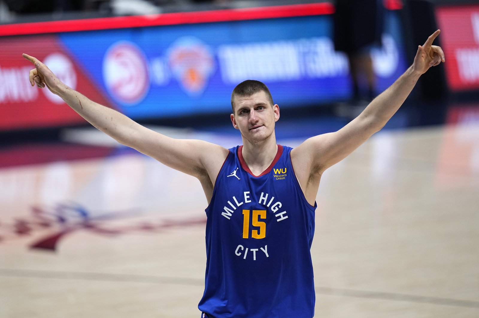 Denver Nuggets center Nikola Jokic celebrate the team's double-overtime win against the Portland Trail Blazers in Game 5 of a first-round NBA Playoff series, Denver, U.S., June 1, 2021. (AP Photo)