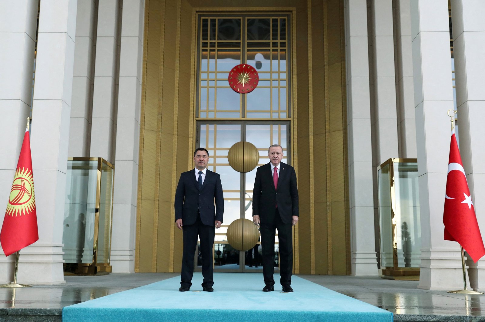 This handout picture released by the Turkish Presidential Press Service shows Turkish President Recep Tayyip Erdoğan (R) posing next to his Kyrgyz counterpart Sadyr Zhaparov (L) during an official ceremony at the Presidential Complex in Ankara, Turkey, June 9, 2021. (AFP Photo)