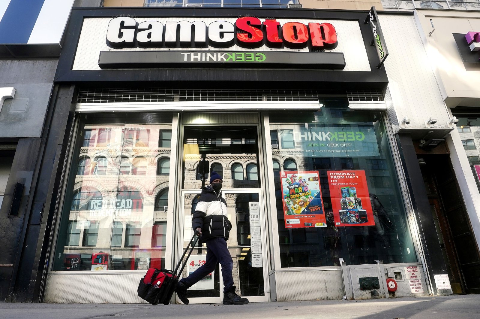 A person walks past a GameStop store in Manhattan, New York City, New York, U.S., Jan. 29, 2021. (Reuters File Photo)