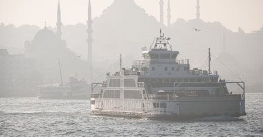 A high concentration of air pollution lowered visibility, making dramatic sights of the historic mosques in the Fatih district as ferries follow their normal routes along the Golden Horn, Istanbul, Turkey, Oct. 24, 2021. (Photo by Getty Images)