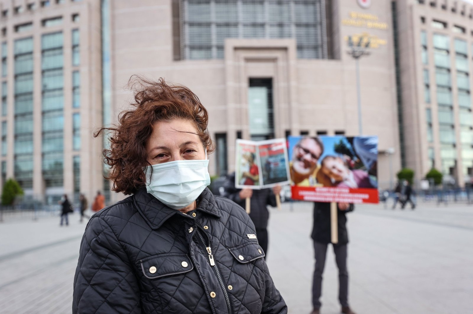 Emine Öztürk protests the imprisonment of his husband Mehmet Ali Öztürk in the UAE in front of a courthouse in Istanbul, Turkey, Dec. 11, 2020. (AA Photo)