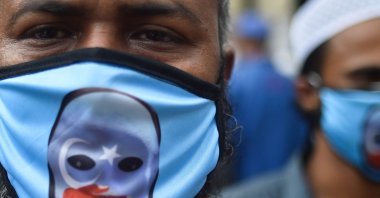 Activists from the political platform Sammilita Islami Oikya Jote stage a protest against the crackdown on Uyghurs in China and to mark the 32nd anniversary of the Tiananmen Square Massacre, in Dhaka, Bangladesh, June 4, 2021. (AFP Photo)