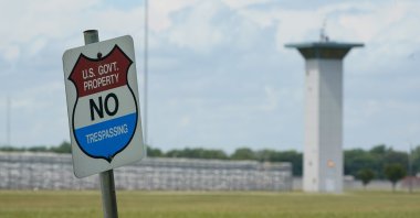 A no trespassing sign is displayed outside the federal prison complex in Terre Haute, Indiana, U.S., Aug. 28, 2020. (AP Photo)