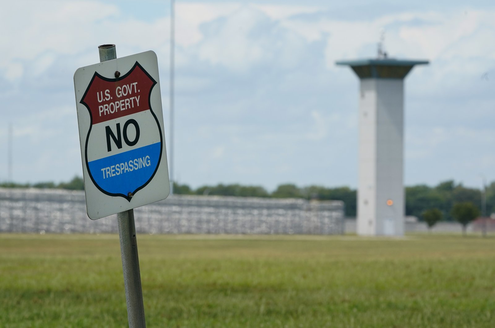A no trespassing sign is displayed outside the federal prison complex in Terre Haute, Indiana, U.S., Aug. 28, 2020. (AP Photo)