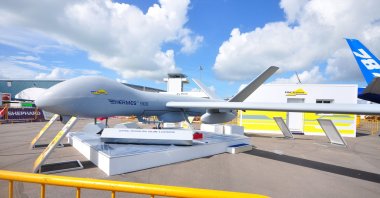 Elbit Sytems showcasing their Hermes 900, a medium-altitude long-endurance UAV, at Singapore Airshow, Feb. 12, 2012. (Shutterstock Photo)