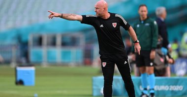 Wales' coach Robert Page speaks to his players during the UEFA EURO 2020 Group A match against Switzerland at the Olympic Stadium, Baku, Azerbaijan, June 12, 2021. (AFP Photo)