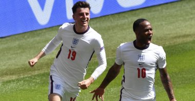 England's Raheem Sterling (R) celebrates with teammate Mason Mount after scoring in the Euro 2020 Group D match against Croatia at the Wembley, London, England, June 13, 2021. (AP Photo)