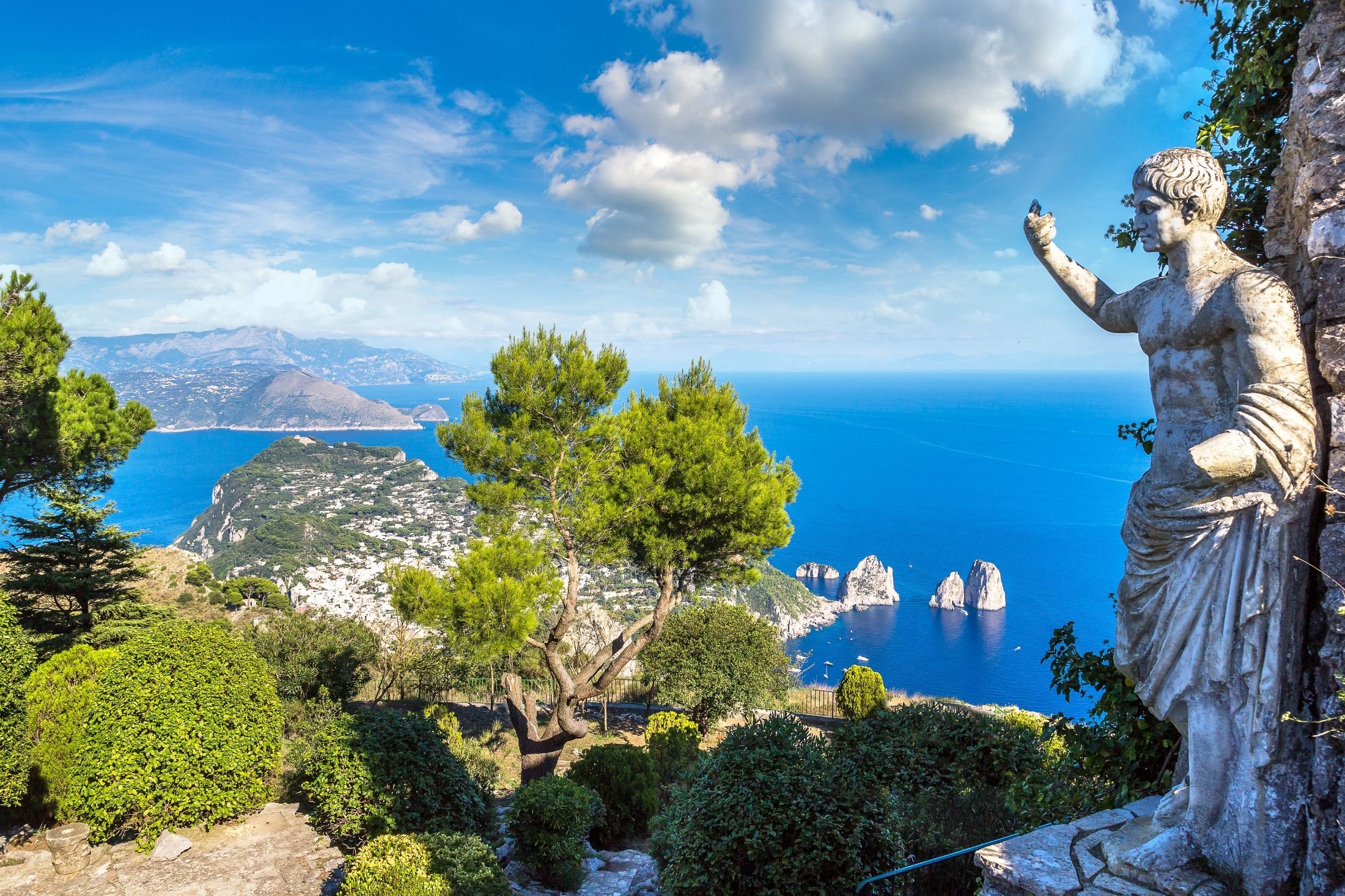 A statue overlooks the island of Capri, Italy. (Shutterstock Photo)