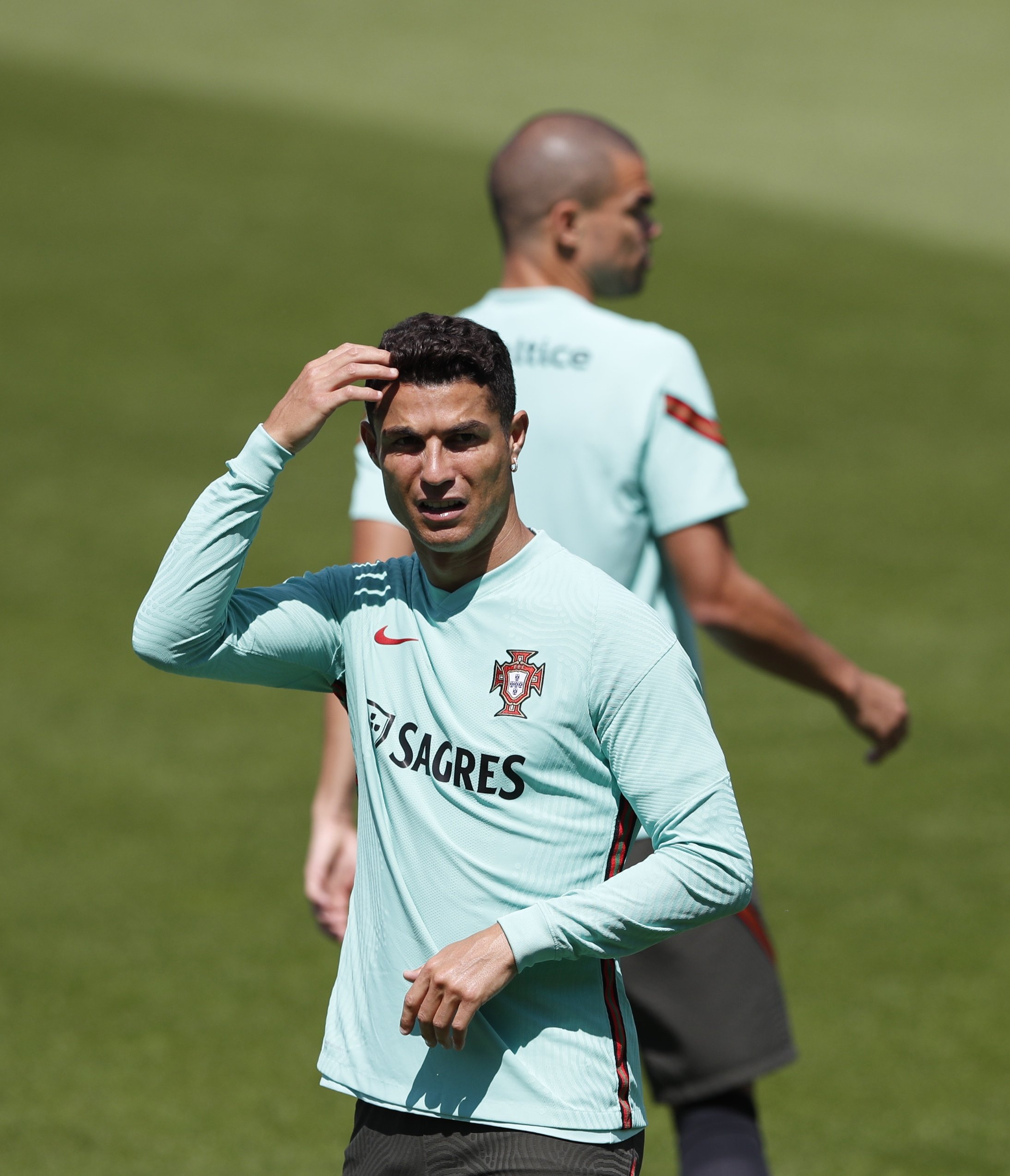 Portugal's Cristiano Ronaldo and Pepe during training at Illovzky Rudolf Stadium, Budapest, Hungary, June 13, 2021. (Reuters Photo)