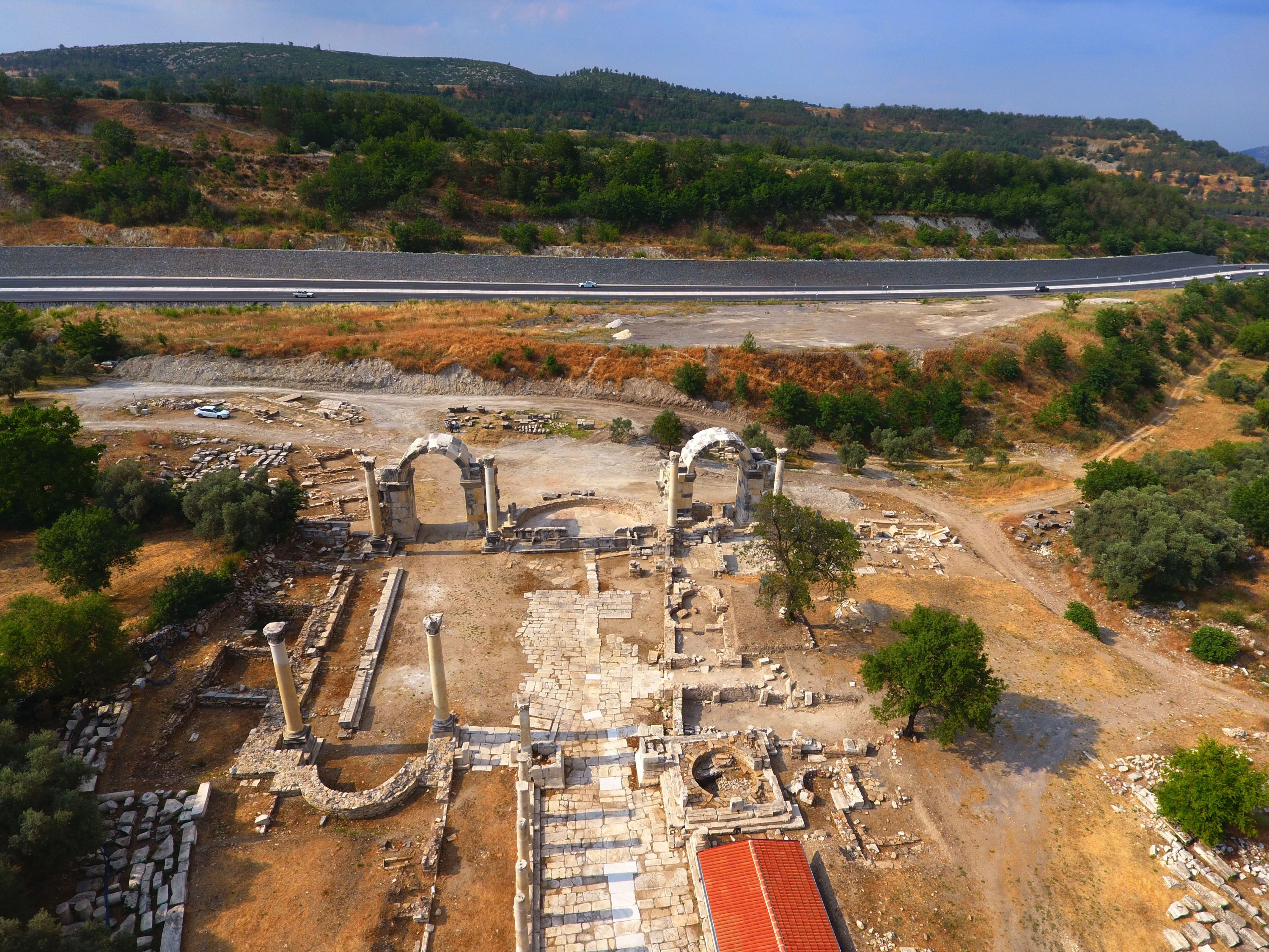 An aerial view shows the recently restored northern entrance to the ancient city of Stratonikeia with two arched gates in Muğla, Turkey, June 13, 2021. (AA Photo)