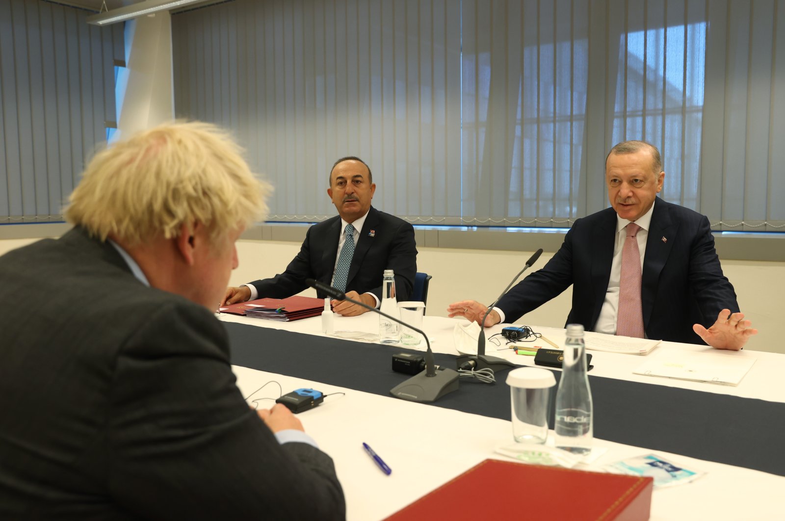 President Recep Tayyip Erdoğan (R), Foreign Minister Mevlüt Çavuşoğlu and British Prime Minister Boris Johnson meet on the sidelines of the NATO summit in Brussels, Belgium, June 14, 2021. (AA Photo)