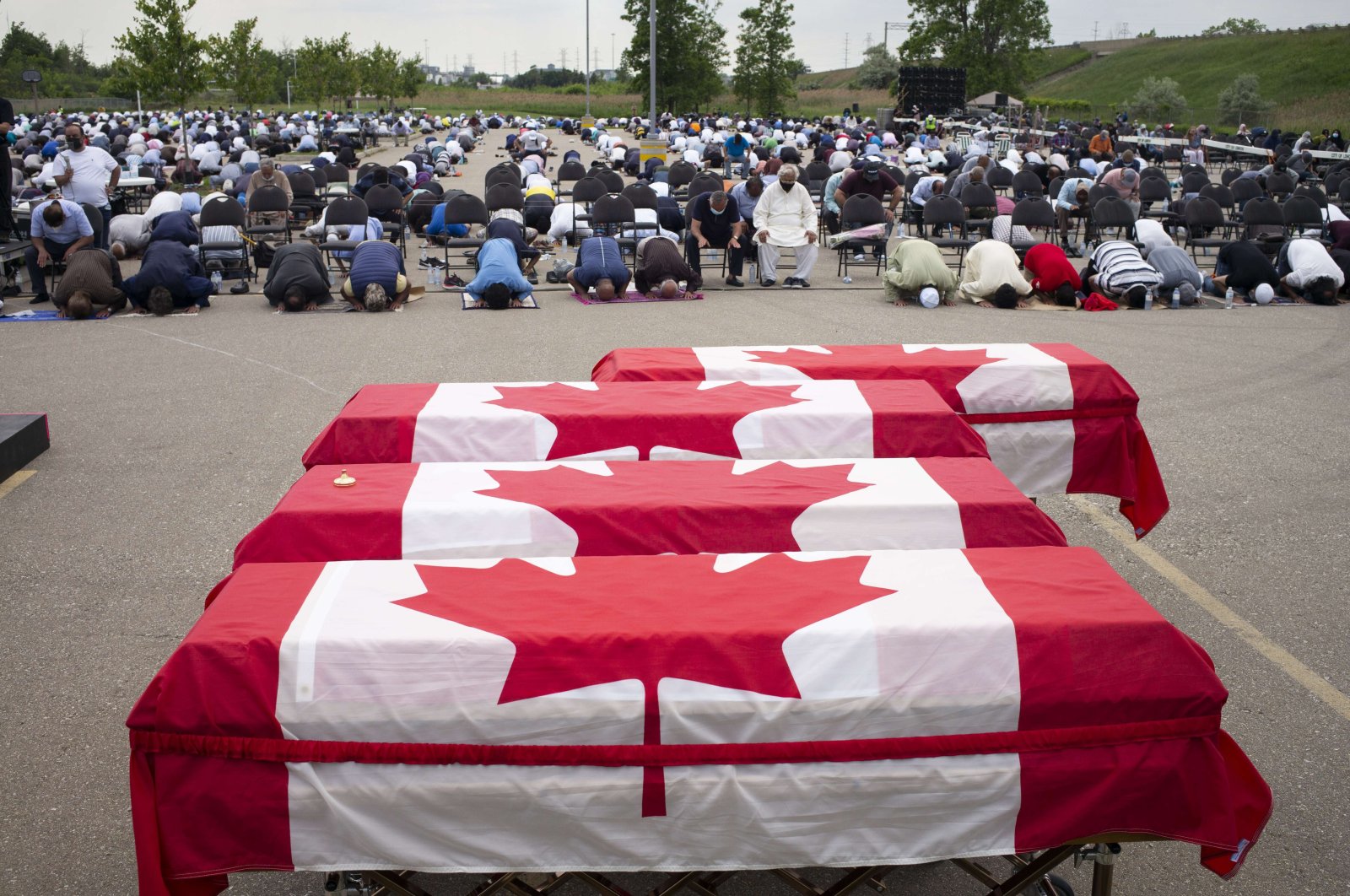 Mourners and supporters gather for a public funeral for members of the Afzaal family at the Islamic Centre of Southwest Ontario in London, Canada, June 12, 2021. (AFP Photo)