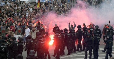 Far-right demonstrators light fireworks in Chemnitz, Germany, Aug 27, 2018. (AP Photo)
