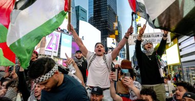 People during a demonstration against Israeli violence in occupied Palestinian territories, in the Times Square, New York City, New York, U.S., May 20, 2021. (AP Photo)