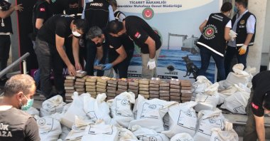 Police and customs officers sort the seized drugs in Mersin, Turkey, June 16, 2021. (AA PHOTO)