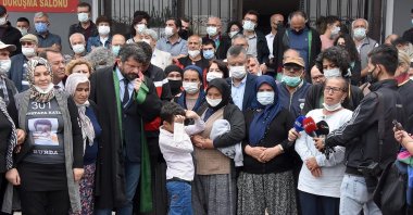 Families of the victims, lawyers and supporters, including the Republican People’s Party (CHP) Group Deputy Chairperson Özgür Özel (C), make statements in front of a court in Akhisar, western Manisa province, Turkey, June 16, 2021. (DHA Photo)