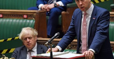 Britain's Prime Minister Boris Johnson (L) listens as Britain's Health Secretary Matt Hancock gives a COVID-19 update statement in the House of Commons in London, U.K., November 26, 2020. (AFP Photo)