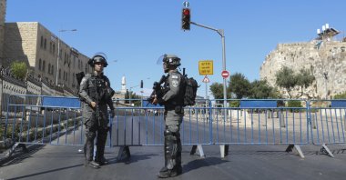 Israeli border police block a main road outside Jerusalem's Old City, June 15, 2021. (AP Photo)