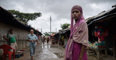 A Rohingya refugee stands on a path in the Nayapara refugee camp near Cox's Bazar, Bangladesh, August, 13, 2018.  (AFP Photo)