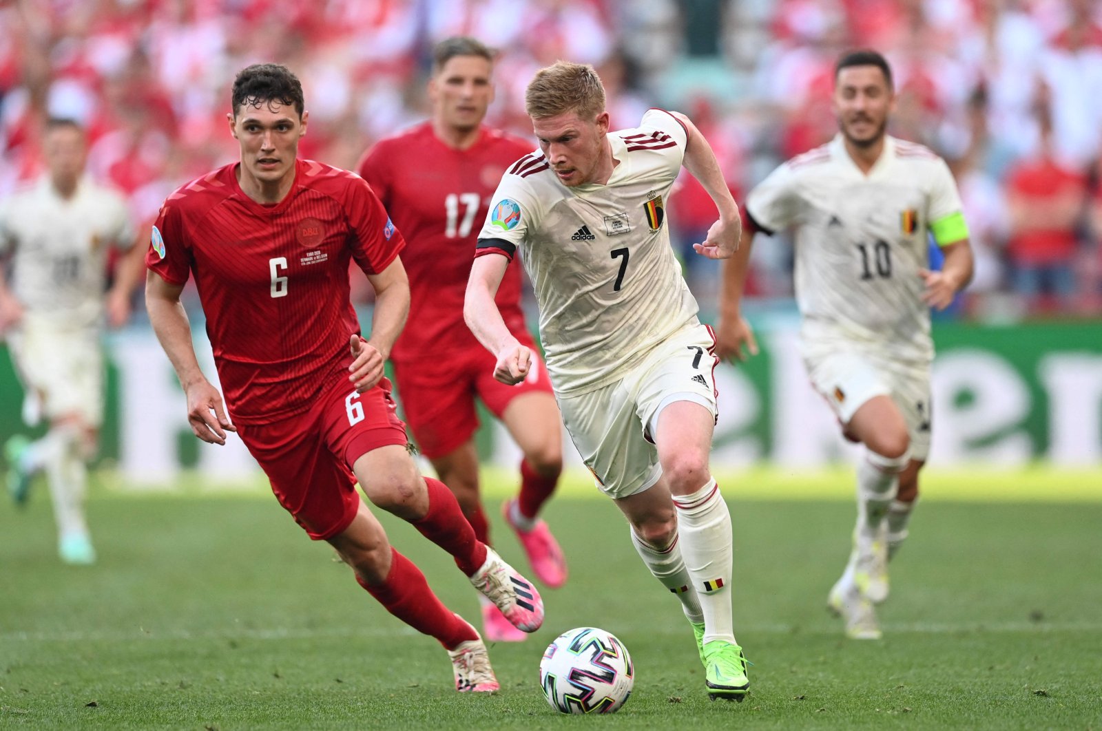 Denmark's defender Andreas Christensen (L) and Belgium's midfielder Kevin De Bruyne vie for the ball during the UEFA EURO 2020 Group B football match between Denmark and Belgium at the Parken Stadium in Copenhagen on June 17, 2021. (AFP Photo)