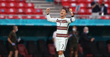 Cristiano Ronaldo celebrates at the end of the EURO 2020 match between Portugal and Hungary, in Budapest, Hungary, June 15, 2021. (AFP PHOTO)