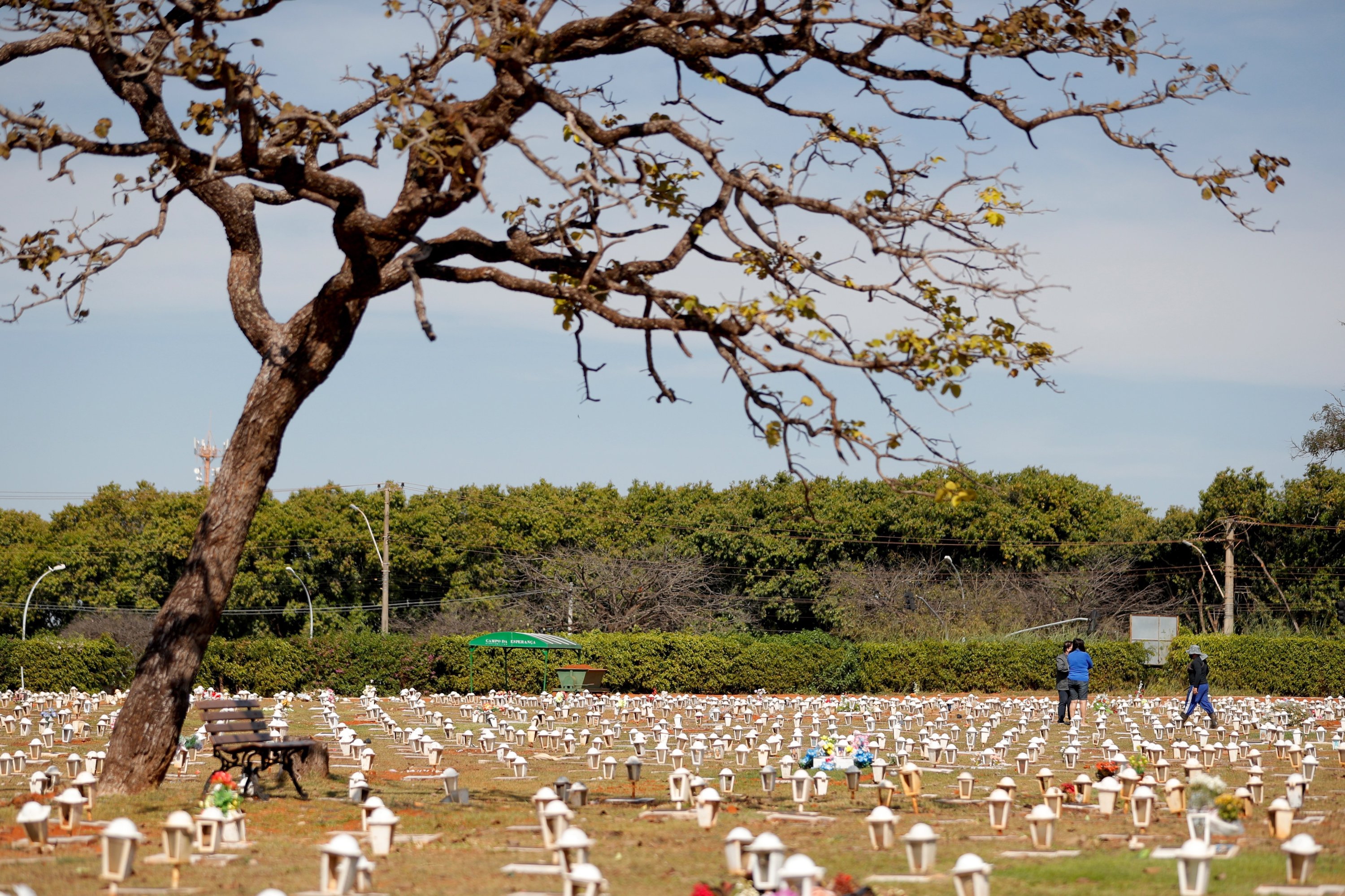 An official walks in the Campo da Esperanca cemetery, in Brasilia, Brazil, June 19, 2021. (EPA Photo)