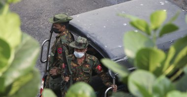Soldiers patrol in Yangon, Myanmar, March 13, 2021. (AP Photo)