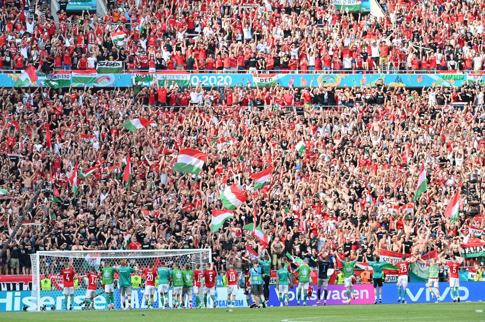 Hungary's players celebrate with the fans after the UEFA Euro 2020 Group F football match against France at Ferenc Puskas Arena in Budapest, June 19, 2021. (Photo: Tibor Illyes/Pool/AFP)