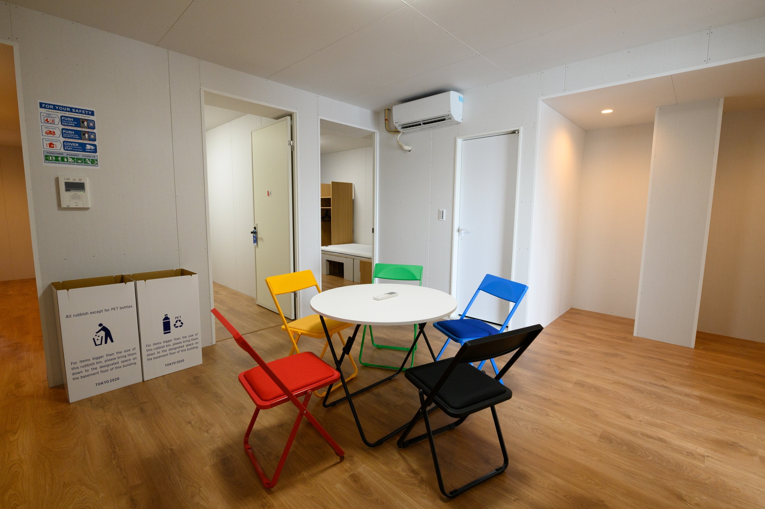 Chairs and a table in a residential unit for athletes at the Olympic and Paralympic Village for the Tokyo 2020 Games, Tokyo, Japan, June 20, 2021. (Reuters Photo)