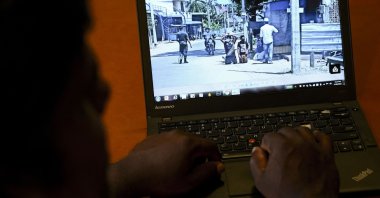 A user reads a social media post on his laptop, Colombo, Sri Lanka, June 20, 2021. (AFP Photo)