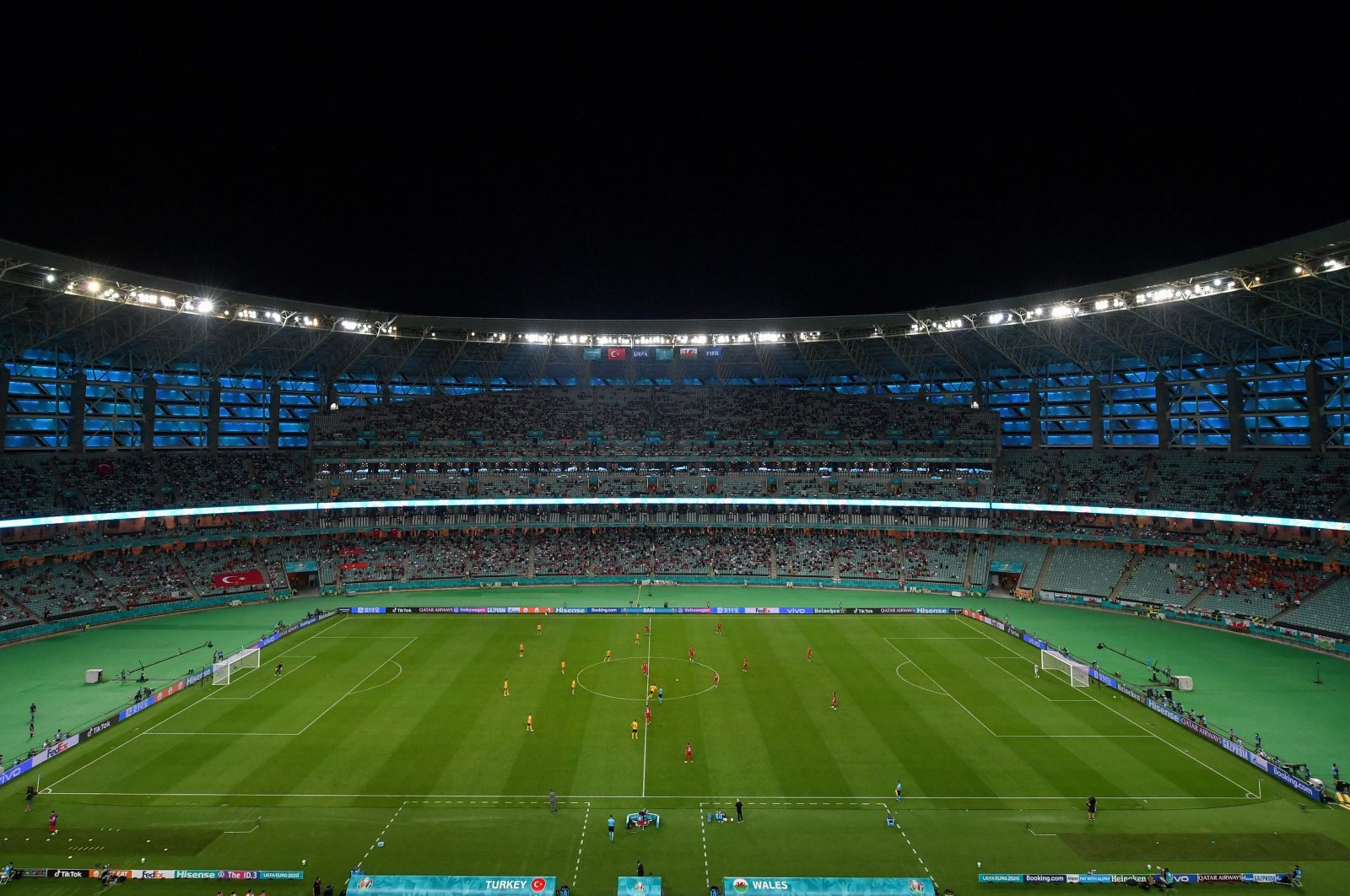 Fans watch the UEFA EURO 2020 Group A football match between Turkey and Wales at Olympic Stadium in Baku, Azerbaijan, June 16, 2021. (AFP Photo)