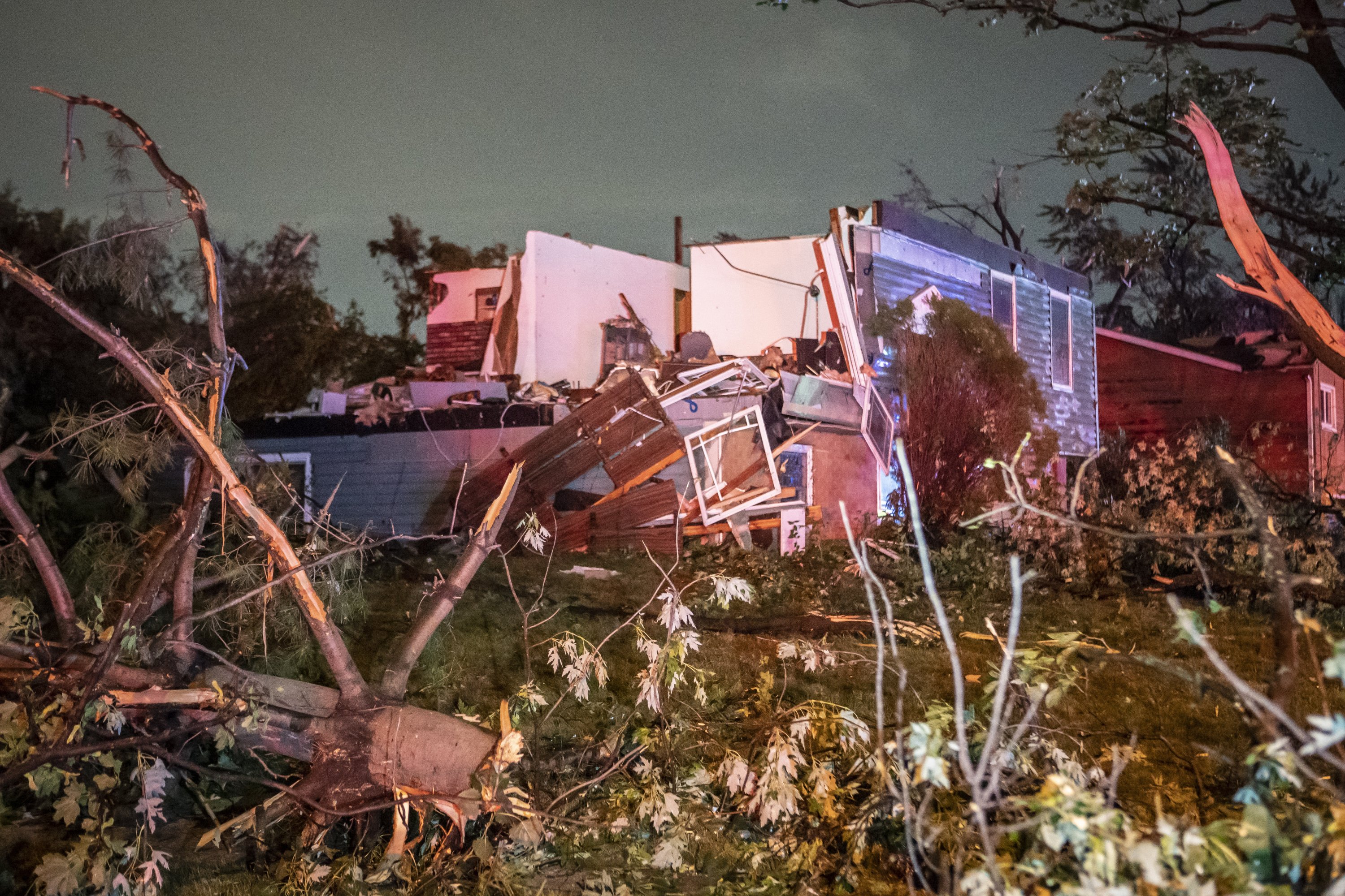 A home is damaged after a tornado swept through the area in Woodridge, Ill., Chicago, Chicago, the U.S., June 21, 2021. (AP Photo)