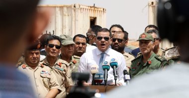 Libyan Interim Prime Minister Abdulhamid Dbeibah, delivers a speech in the town of Buwairat al-Hassoun, during a ceremony to mark the reopening of a 300-kilometer road between the cities of Misrata and Sirte, Libya, June 20, 2021. (AFP Photo)