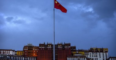 The Chinese flag flies at a plaza near the Potala Palace in Lhasa in western China's Tibet Autonomous Region, June 1, 2021. (AP Photo)